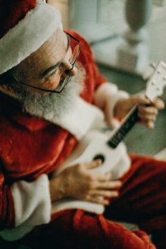 santa playing guitar